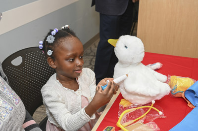 Four year-old sickle cell disease patient at Children’s Regional Hospital at Cooper in Camden, NJ, Eva Dey, plays with her My Special Aflac Duck, a caring robot that Aflac is giving to kids with sickle cell disease to help them through their medical journey.
