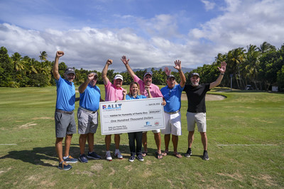 Trailer Bridge & ATS Executives celebrate alongside Habitat for Humanity of Puerto Rico Executive Director Amanda Silva and Board Members from the nonprofit following the event's check presentation.