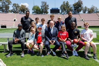 Run Rich Run kicks off 60 Days for St. Jude Children’s Research Hospital. Rich Eisen with St. Jude patient Alexander, Play 60 Super Kid Aubrey Anaya, 
Cris Carter, Rod Woodson, Eric Metcalf, and Michael Vick on Saturday, April 30, 2022 in Pasadena, California. (Ryan Kang/NFL)