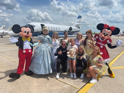 Violetta Herasymenko and her daughter Ulliana traveled to Orlando International Airport in Newlin’s private plane where they received a warm welcome from Mickey and Minnie Mouse