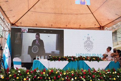 Honduran President Iris Xiomara Castro Sarmiento addresses the crowd by video conference.