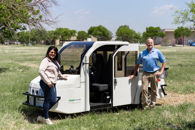 Exro CEO Sue Ozdemir and evTS CTO Greg Horne with Exro-powered evTS Firefly vehicle (CNW Group/Exro Technologies Inc.)