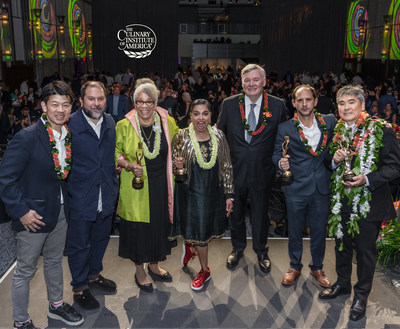 Six champions of global cuisine were honored at The Culinary Institute of America's Leadership Awards--the Augies. Pictured, from left to right, are: Chefs Jungsik Yim and Enrique Olvera, author and culinary historian Dr. Jessica B. Harris, Chef Maneet Chauhan, CIA President Dr. Tim Ryan, and Chefs Pedro Miguel Schiaffino and Roy Yamaguchi. The event was held at New York's Ziegfeld Ballroom.