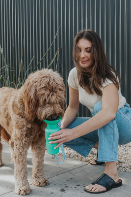Shannon and her goldendoodle, Rishi, using the Springer Classic Travel Bottle