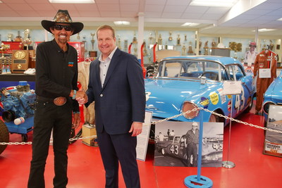 Donny O'Banion of Motor Home Specialists shakes hands with Richard Petty