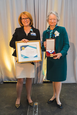 CHOP President and CEO Madeline Bell presenting the CHOP Gold Medal to Dr. Katherine High