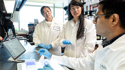 Scientists found that without vaccination, infection with Omicron does not provide robust immunity against other COVID-19 variants. In this photo are the study's first authors, Tongcui Ma (left), Irene Chen (center), and Rahul Suryawanshi (right). Photo: Michael Short/Gladstone Institutes