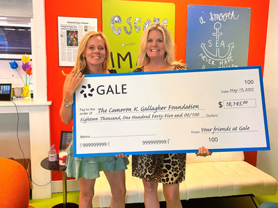 (From Right to Left): Heather Hayes, executive education consultant at Gale presenting Grace Gallagher, Cameron’s mother and Executive Director of the CKG Foundation with a check for more than $18,000 from the proceeds of Cameron's Collection and Cameron's Camp for Wellness.