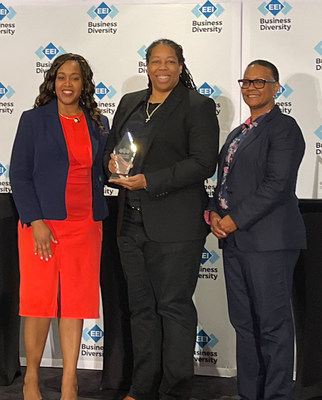 KDM Engineering President Kimberly Moore (center) accepts the Edison Electric Institute's 2022 Business Diversity Award May 19 in Los Angeles.