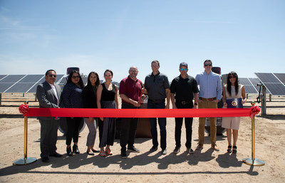 POM Wonderful hosted a ribbon cutting ceremony to celebrate the completion of its new solar farm and transition to 100% recycled plastic bottles. Steve Swartz, chief strategy officer, Wonderful Company and Derrick Miller, president, POM Wonderful (center) led the ribbon cutting.
