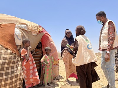 Action Against Hunger’s nutrition teams work across Somalia to prevent and treat hunger. Here, health workers provide advice to a mother displaced by drought and conflict.