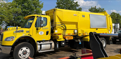 SAS Grid Guardian AI uses power line emissions data captured by mobile IoT devices like this white one mounted on the roof of a garbage truck.