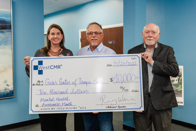 CEO Randy Ware presents representatives of the Crisis Center of Tampa Bay a $10,000 check in honor of WestCMR's 25th Anniversary and Mental Health Awareness Month.