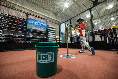 A young athlete using the HitTrax technology and batting cage inside DICK’S Sporting Goods (Cranberry Twp, PA)
