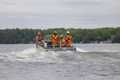 Hydro One crews set off to restore power to multiple islands on Stoney Lake. (CNW Group/Hydro One Inc.)