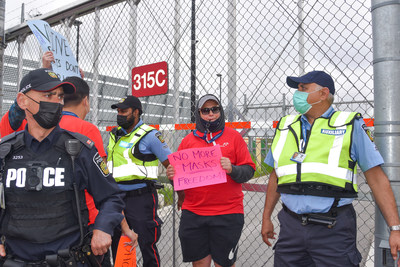 Participants take part in mock protest as part of emergency exercise at Toronto Pearson. (CNW Group/Greater Toronto Airports Authority)