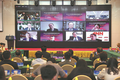 Guests and speakers attend, some of them virtually, the RCEP Media & Think Tank Forum in Haikou, Hainan province, on Sunday. Liang Dingsuo / for China Daily