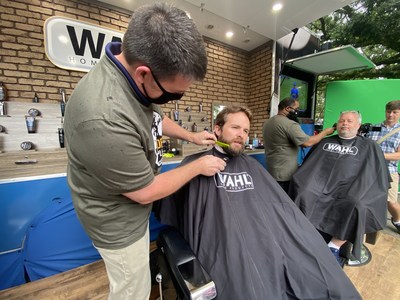 Wahl will be parking its mobile barbershop at the Ocean Springs Chamber of Commerce's Red, White & Blueberry Festival on Saturday, June 4, 2022 from 10 a.m. ? 2 p.m. (central). The public is invited to visit the barbershop; and for every FREE beard trim Wahl will donate $100 to the 1720Foundation, an organization that helps families cover the many unexpected costs that come with adoption. Jonathan Brannan is pictured getting his beard trimmed at the barbershop in 2021.