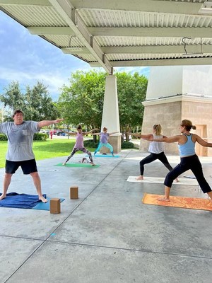 Yoga class at Delray Market Place Amphitheater as part of 55+ Wellness Series powered by Baptist Health Foundation