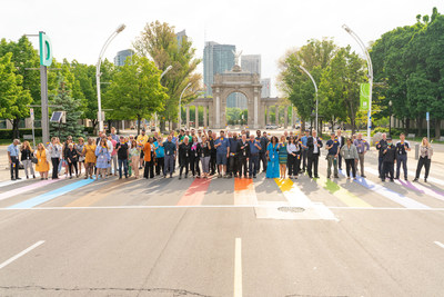 The Exhibition Place Team celebrating the start of Pride Month at the Rainbow Crosswalk, located on Princes' Boulevard | Photo Credit: Adam Freeman for Exhibition Place (CNW Group/Exhibition Place)