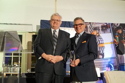 Craig Snider (right) presents award to Don McKee.
