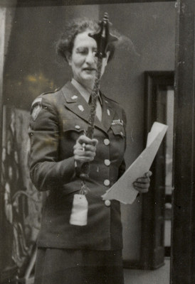 Capt. Edith A. Standen inspects a scepter at the Wiesbaden Central Collecting Point.