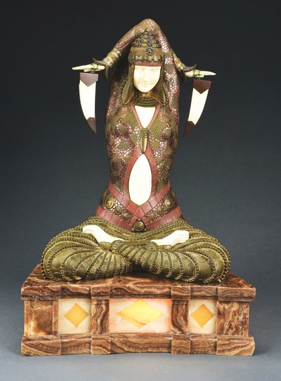 Demetre Chiparus (Romanian, 1886-1947), 'Civa', cold painted bronze and gilt leaf on illuminated onyx plinth, signed and stamped, French, circa 1928, 21¼in high x 14½in wide by 9½in deep.  Shown in 