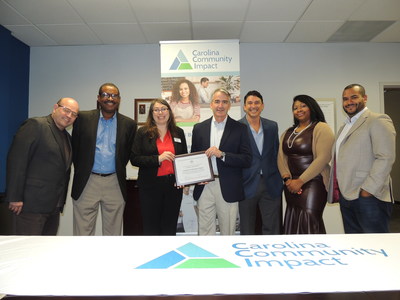 Pictured (from left to right): Steve Cole, Joe Battle, Aregnaz Mooradian (SBA NC Deputy Director), Mike Croxson (CEO of CCI), Scott Wolford, Atiya Ward and Frank Del Villar