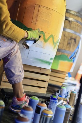 ELLE Street Art creating Bulleit "Art Barrels"