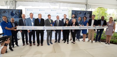 REGENXBIO President and CEO Ken Mills cuts the ribbon to celebrate the opening of the company’s Manufacturing Innovation Center in Rockville, Maryland