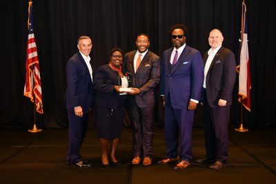 Comerica Bank representatives (left) Paul Gerling, Austin Market President; Vanessa T. Reed, National External Affairs Manager; Brandon Q. Jones, North Texas External Affairs Manager; and Irvin Ashford, Jr., Chief Community Officer accept the Texas Bankers Foundation’s Leaders in Financial Education (LiFE) Award from Texas Bankers Association President & CEO Chris Furlow. Photo credit: Rob Wilson of RC Photographic Productions, Inc.