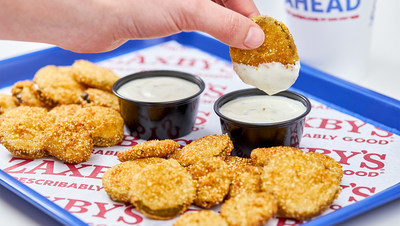 Zaxby’s offers free Fried Pickles for Father’s Day. Fried Pickles deal is good for dads all day on Sunday, June 19, 2022.