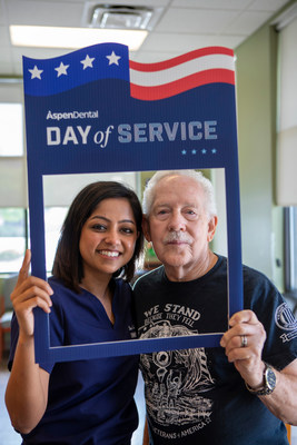 Dr. Roma Patel, owner of the Pooler, Georgia Aspen Dental location, poses with a patient during Aspen Dental's annual Day of Service event. During Day of Service, hundreds of Aspen Dental locations nationwide open their doors to provide free dental care to U.S. military veterans.