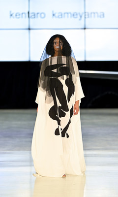 A model walks the runway for Project Runway winner Kentaro Kameyama