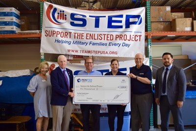 PenFed President/CEO James Schenck and PenFed Chairman of the Board Ed Cody present a check to Support The Enlisted Project to assist service members and transitioning veterans.