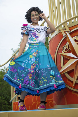 Mirabel from Walt Disney Animation Studios’ hit film “Encanto” will make her debut June 26, 2022, at Magic Kingdom Park at Walt Disney World Resort in Lake Buena Vista, Fla. She will be featured in the “Disney Adventure Friends Cavalcade!” which winds its way through the park several times each day. This super-sized cavalcade features nearly 30 Disney and Pixar friends, including Miguel from “Coco,” Nick and Judy from “Zootopia,” Baloo and King Louie from “The Jungle Book,” Princess Elena, Merida, Moana, The Incredibles and more. The “Disney Adventure Friends Cavalcade!” is part of a growing line-up of new and returning magical entertainment at Magic Kingdom Park during the Walt Disney World 50th Anniversary celebration. (David Roark, Photographer)