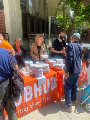 New York City Council Member Julie Menin (District 5) distributes meals at The Stanley M. Isaacs Center on May 25, 2022.