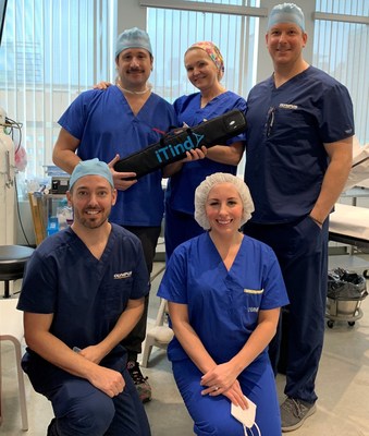 Dr. Dean Elterman, back left, has performed the first iTind procedures in Canada.