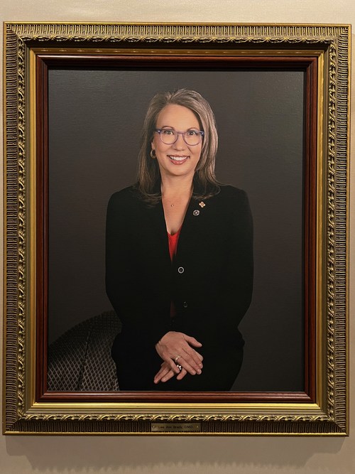 Portrait of Dr. Lee Ann Brady hanging in Master's Hall at The Pankey Institute
