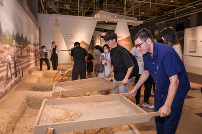 Visitors experience archaeological work at the Daming Palace Archaeological Exploration Center.
