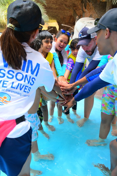 This year's World's Largest Swimming Lesson on June 23rd reached tens of thousands of kids and their parents in 14 countries across 5 continents. Host locations like Desert Falls Water Park at Hilton Salwa Beach Resort in Qatar taught kids how to kick, float, find a safe exit and keep themselves safer in and around the water.