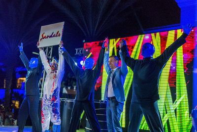 Theatrical phenomenon Blue Man Group and Sandals Resorts Executive Chairman, Adam Stewart, on stage at Sandals Royal Curaçao’s Grand Opening Celebration - Photo Credit Corey Hamilton for Sandals Resorts.​