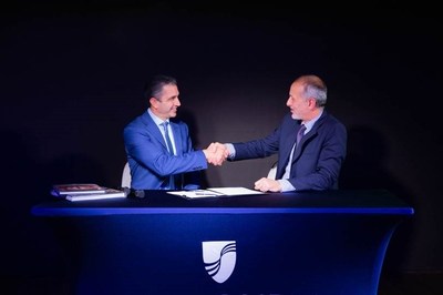 Josh Leibowitz, president of Seabourn, and Marco Ghiglione, managing director, T. Mariotti Shipyard, sign documents to complete the delivery of Seabourn Venture, the line’s first ultra-luxury expedition ship.