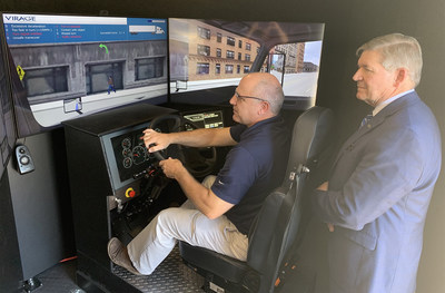 Rich Hernandez, Vice President of Transportation and Warehousing at Perdue Farms, checks out the mobile driving simulator at Wor-Wic Community College in Salisbury, Md., as college President Ray Hoy looks on. Perdue awarded the college a $120,000 Perdue Foundation grant to purchase a new driving simulator for students in the commercial driver’s license program
