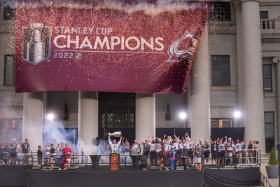 Colorado Avalanche players celebrate as captain Gabriel Landeskog hoists the Stanley Cup during Thursday's championship rally in Denver. Photo by Brent Andeck / VISIT DENVER