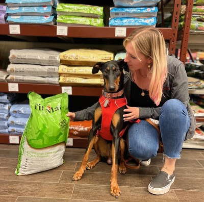 Alyssa Soares, Social Media Specialist for Pet Food Express, with her dog SLOAN, recently adopted from Oakland Animal Services. (Photo Credit: Matt Floriani)