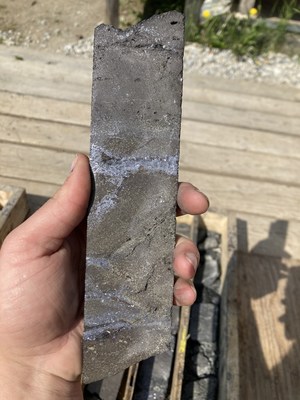 Photo 9. WPC22-08 - Massive sphalerite cut by argentiferous galena veinlets (CNW Group/Western Alaska Minerals Corp.)