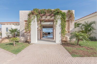 Overlooking the Sea of Cortez, Casa Cortez is a contemporary four-bedroom home offering sweeping views. This home is available for $475,000 for 1/8 ownership via Pacaso's innovative co-ownership model.