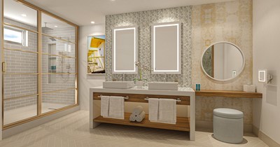 Fashion forward bathrooms in the Travertine Beachfront rooms will make a splash with bright, contemporary photography and gold accents
