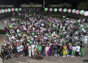 Alpha Kappa Alpha Sorority Members Aglow in Pink and Green at Disney's Animal Kingdom Theme Park at Walt Disney World Resort Ahead of National Convention in Orlando
